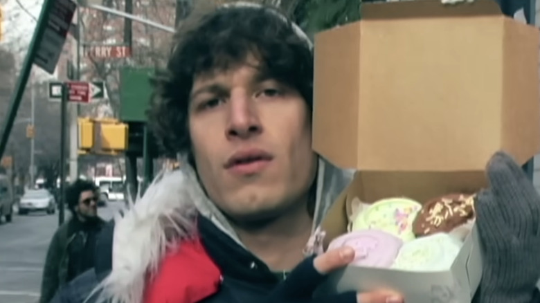 Andy Samberg holding up a box of Magnolia cupcakes in Lazy Sunday on SNL