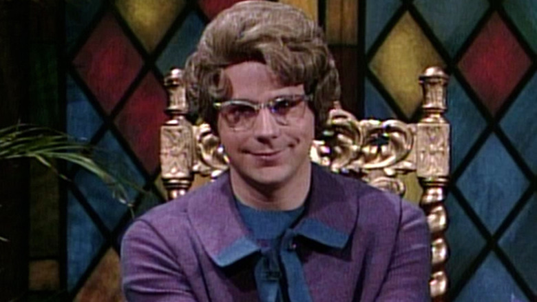 Dana Carvey as the Church Lady smiling in a Church Chat sketch on SNL