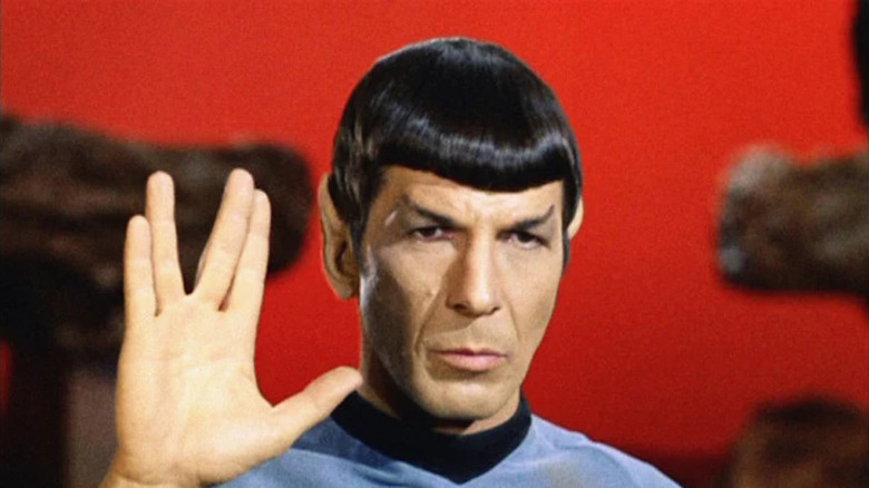 Spock (Leonard Nimoy) holds up the Vulcan salute in Star Trek: The Original Series