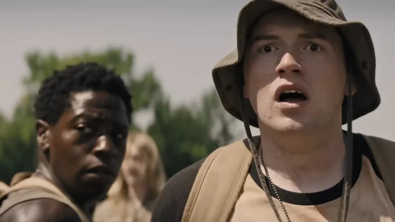 Pete McVries (David Jonsson) and Ray Garraty (Cooper Hoffman) look back shocked in The Long Walk