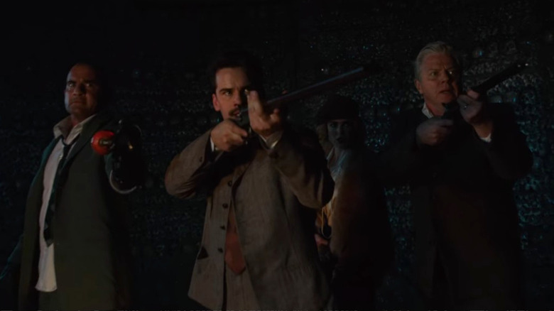 Mick Rory, Ernest Hemingway, Sara Lance, and Hank Heywood approach the minotaur in "Legends of Tomorrow" episode "Tender Is The Nate"