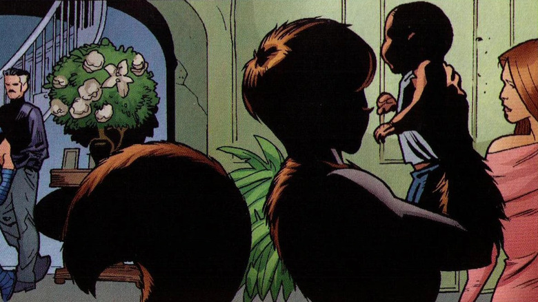 Squirrel Girl holding a baby