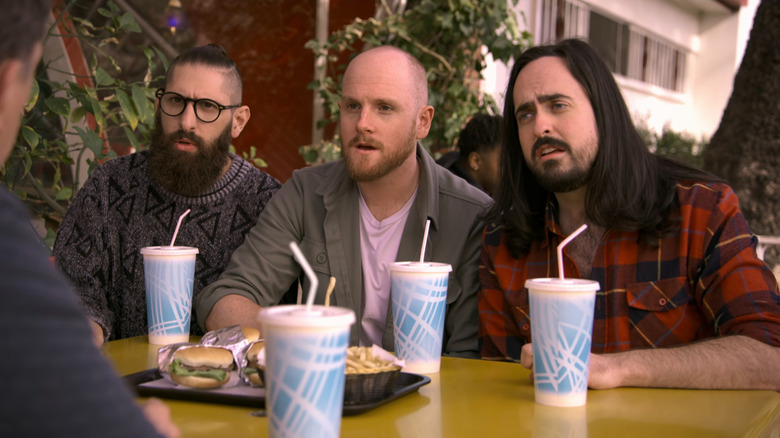 Mark, Broden, and Zachary sitting outside on Aunty Donna's Big Ol' House of Fun