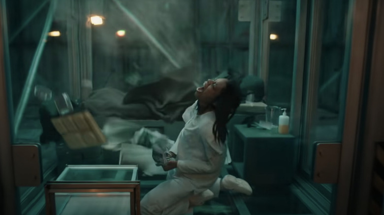 Naomi Harris in "Venom: Let There Be Carnage" screaming in cell