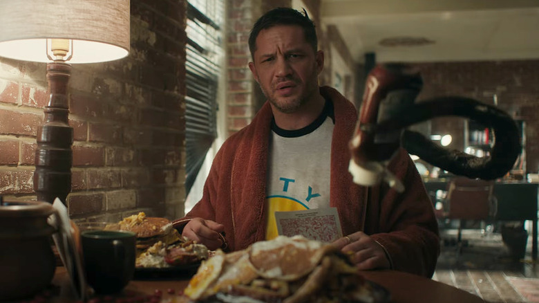 Tom Hardy and Venom eat breakfast in "Venom: Let There Be Carnage"