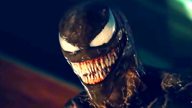 Venom smiles shows teeth in Let There Be Carnage