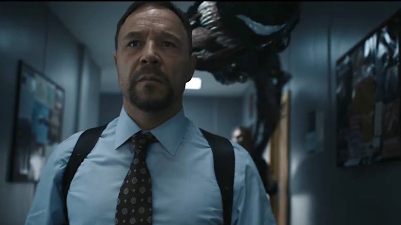 Stephen Graham in "Venom: Let There Be Carnage" stalked by Venom