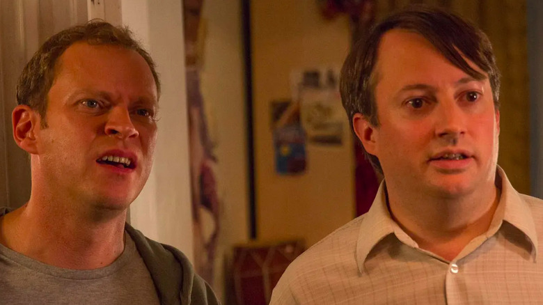 Mark and Jeremy standing next to each other