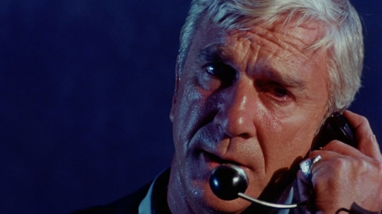 Leslie Nielsen on phone at night