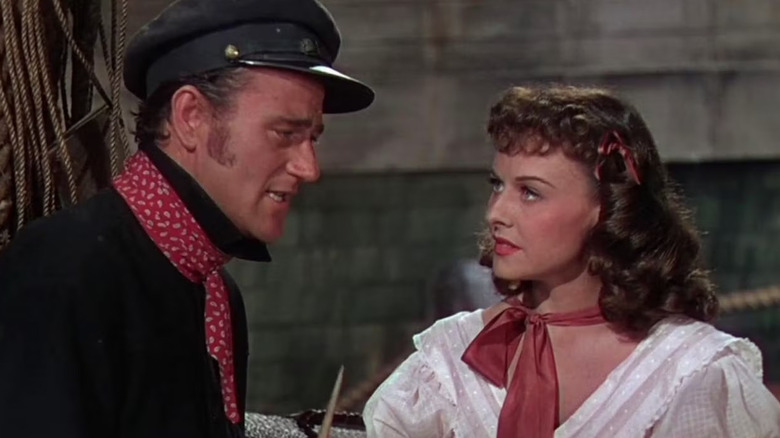 Jack (John Wayne) charms Loxi (Paluette Goddard) in Reap the Wild Wind