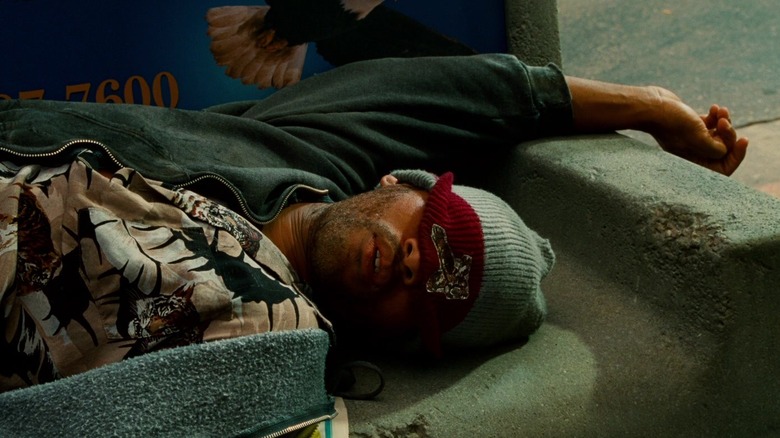 John Hancock (Will Smith) passed out on a bench in Hancock