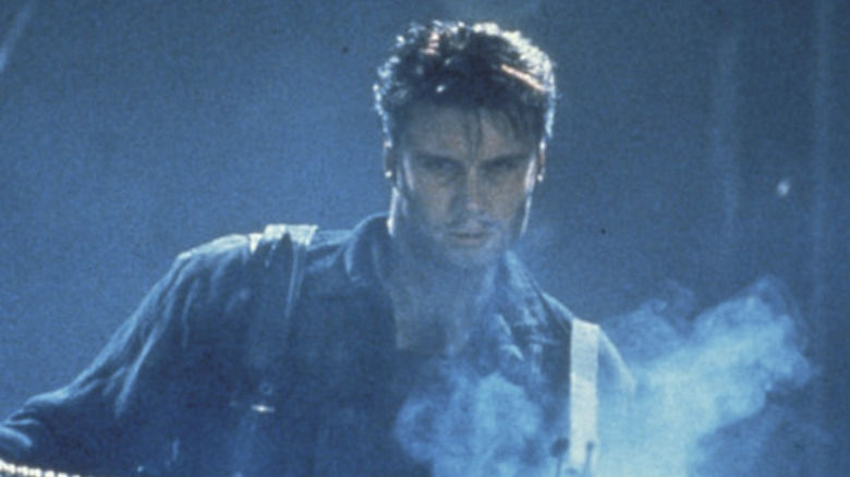 Frank Castle (Dolph Lundgren) shoots bad guys in The Punisher
