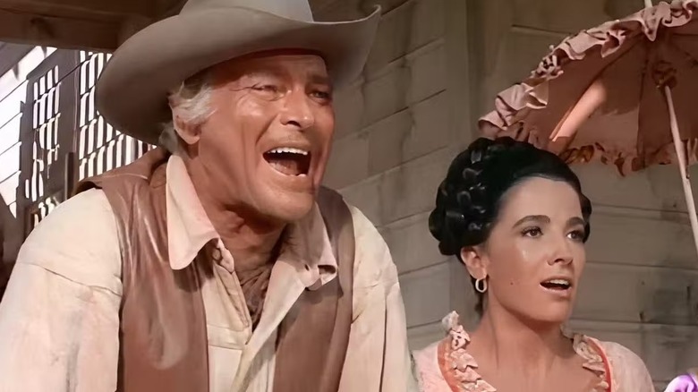 John Cannon (Leif Erickson) shouts next to Victoria (Linda Cristal) in The High Chaparral