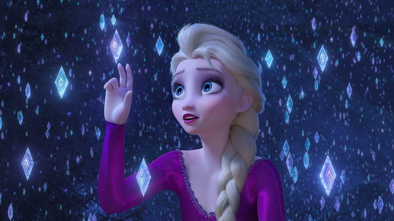Elsa (Idina Menzel) touches a mysterious force in Frozen II