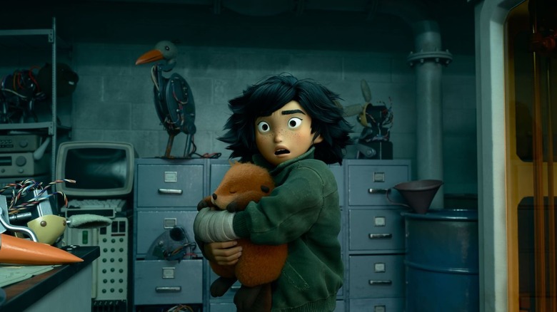 Mabel Tanaka (Piper Curda) snatches a robot animal skin in Hoppers