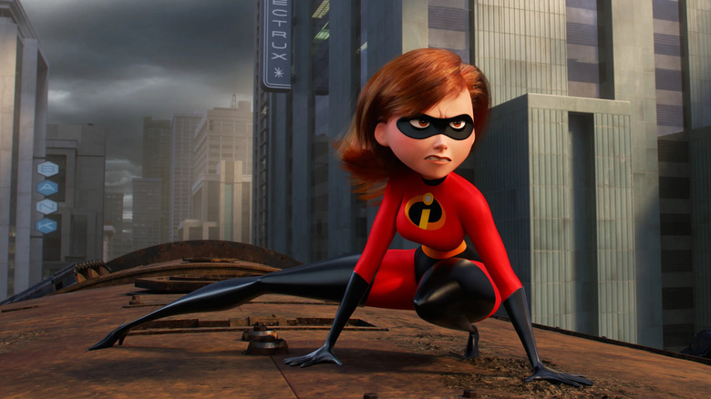Elastigirl (Holly Hunter) boards a train in Incredibles 2