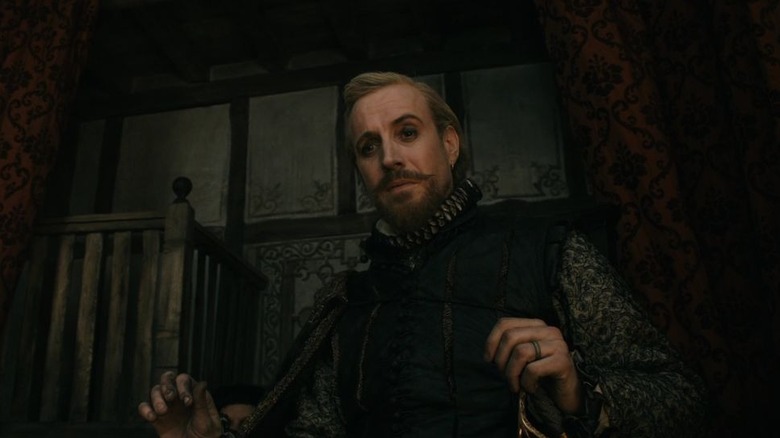 Rhys Ifans as Edward de Vere, 17th Earl of Oxford in Anonymous, in his Victorian vest and neck ruff.