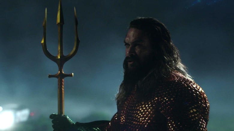 Jason Momoa's Aquaman holding his trident in Peacemaker
