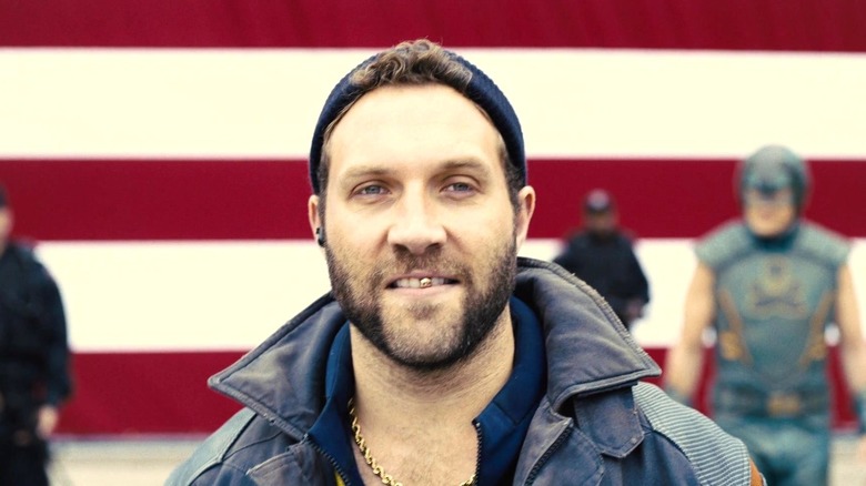 Jai Courtney's Captain Boomerang showing off his gold tooth in The Suicide Squad