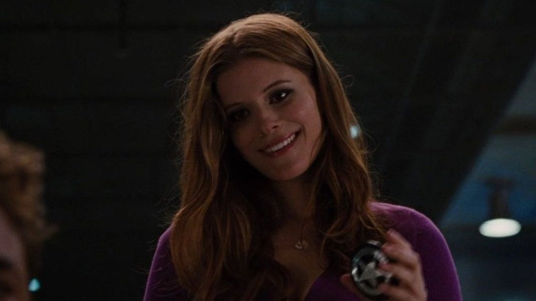 Kate Mara as U.S. Marshal shows off her badge in Iron Man 2
