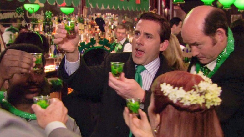 Steve Carrell as Michael Scott, drinking with his coworkers on The Office