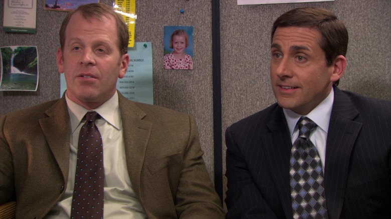 Paul Lieberstein and Steve Carrell as Toby and Michael, sitting in a cubicle together on The Office