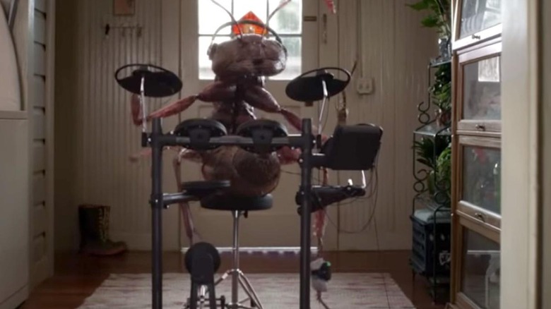 A giant ant plays an electronic drum kit in Ant-Man and the Wasp