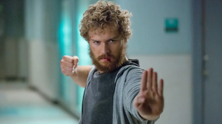 Finn Jones as Danny Rand, preparing to fight in Iron Fist
