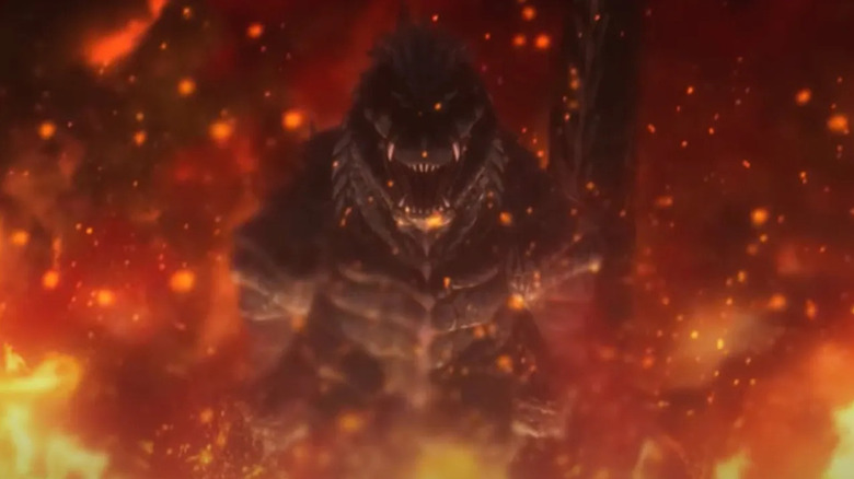 Godzilla appears in a cloud of red dust in Godzilla: Singular Point