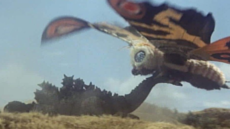 Mothra drags Godzilla by the tail in Mothra vs. Godzilla