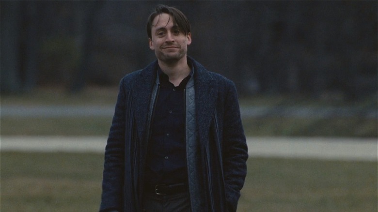 Roman Roy smiling