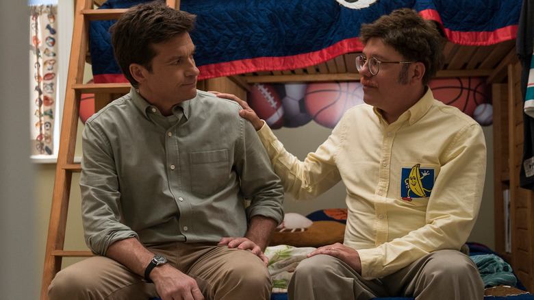 Jason Bateman as Michael Bluth and David Cross as Tobias Fünke, talking on George Michael's bed in Arrested Development.