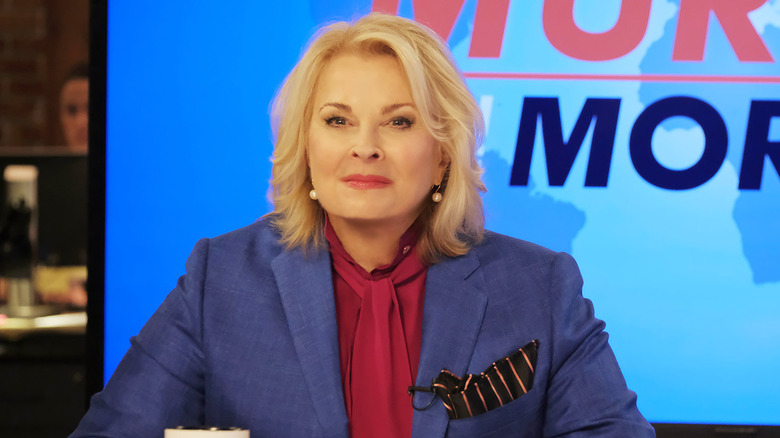 Candice Bergen as Murphy Brown, sitting behind her desk in the 2018 revival of Murphy Brown.