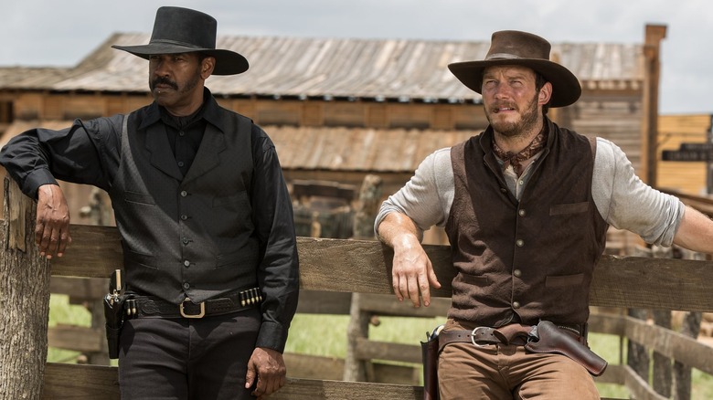 Denzel Washington as Sam Chisolm and Chris Pratt as Joshua Faraday hand out at the ranch in The Magnificent Seven