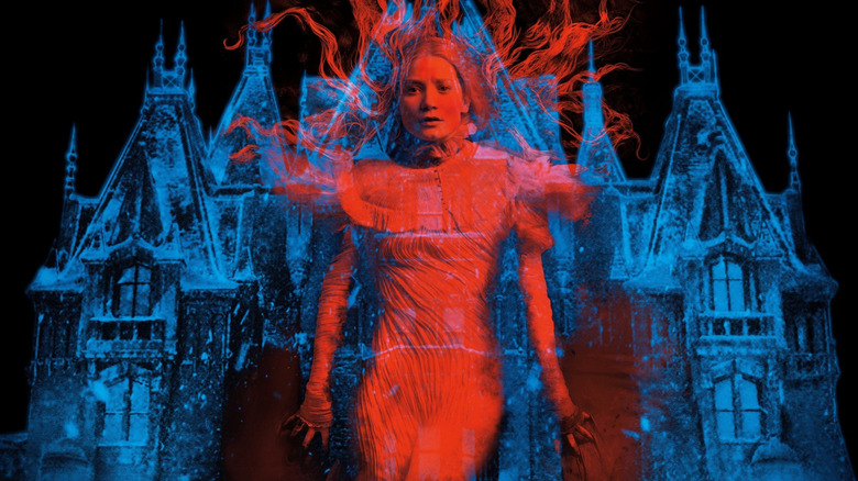 Mia Wasikowska as Edith as a red ghost hovering in front of the mansion on the poster for Crimson Peak