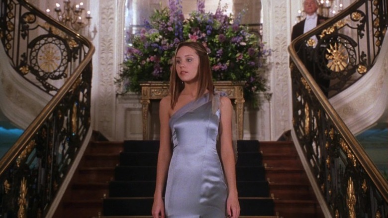 What a Girl Wants: Daphne in ball gown descends staircase
