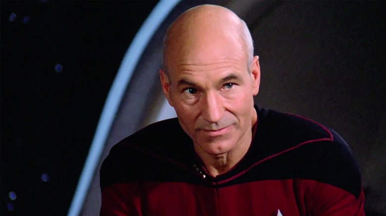 Picard looks on, pensively