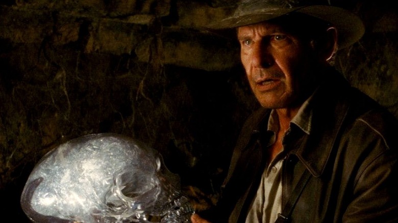 Indiana Jones holds crystal skull