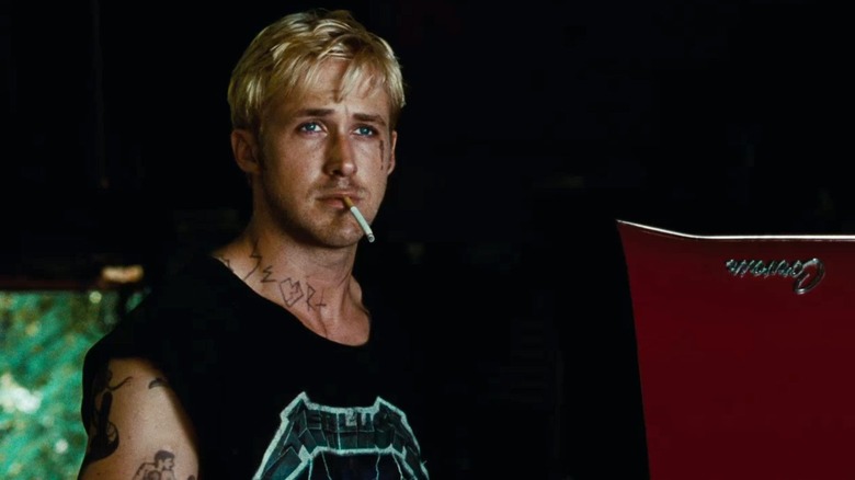 Tattooed Ryan Gosling smoking