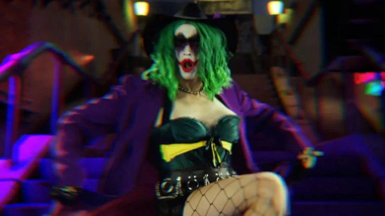 Vera Drew as the Joker with green hair, Joker makeup, and purple jacket in The People's Joker