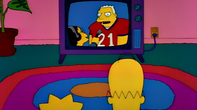 Homer and Lisa watching TV