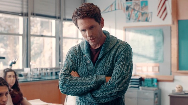 Dr. Jack Griffin (Glenn Howerton) teaching his class with his arms crossed in A.P. Bio (2018-2021)