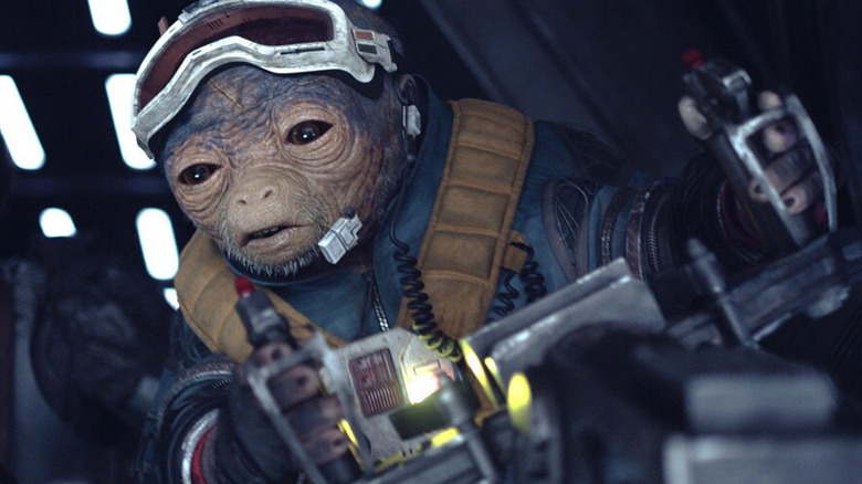 Rio Durant, voiced by Jon Favreau, prepares to rescue Han and Chewie in Solo: A Star Wars Story