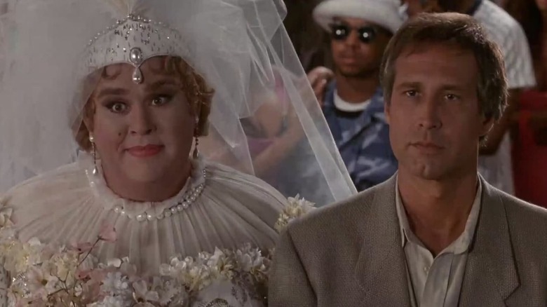 Chris Thorne (Chevy Chase) marries Eldona (John Candy) in Nothing But Trouble