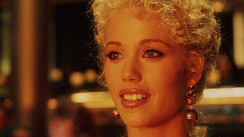 Nomi (Elizabeth Berkley) watches a show in Showgirls
