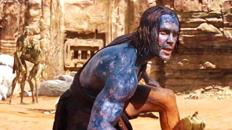 John Carter (Taylor Kitsch) prepares to fight in John Carter