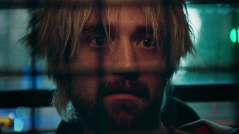 Robert Pattinson looking away