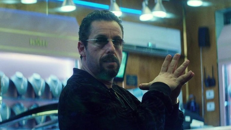 Adam Sandler hands clasped