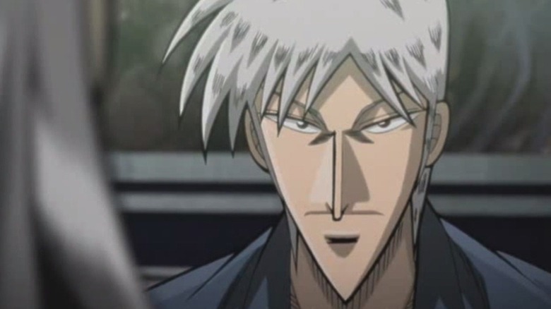 Shigeru Akagi sits impassively in Akagi