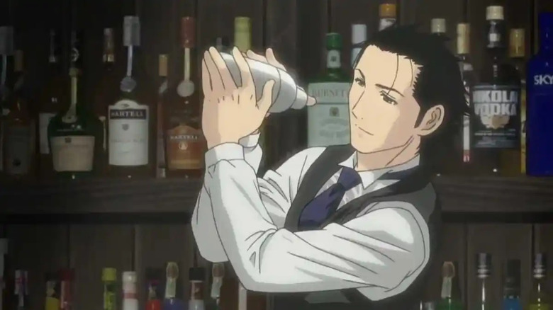 Ryū Sasakura mixes a cocktail in a shaker behind the bar in Bartender